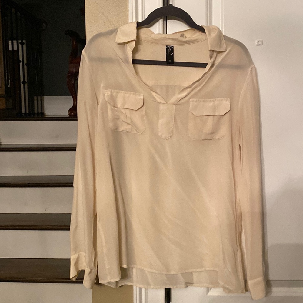 Mercury size medium women’s silk collared blouse with pockets.